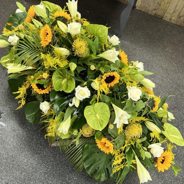 Glowing Opulence Casket Spray
